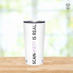 White insulated tumbler featuring "Scan-xiety is Real" text with lavender cancer awareness ribbon on wooden surface